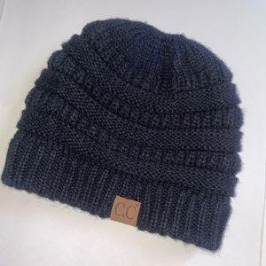 C. C. soft knit beanie with pony tail hole